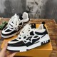 L Skater Style Chunky Black And White Trainers Pair Display Pair of L skater style chunky black and white trainers arranged together on a surface