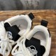 L Skater Style Chunky Black And White Trainers Heel Collars Close-up of heel collars and pull loops on L skater style chunky black and white trainers