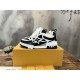 L Skater Style Chunky Black And White Trainers On Box Side profile of L skater style chunky black and white trainers resting on a branded box