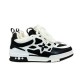 L Skater Style Chunky Black And White Trainers Studio View Studio profile view of L skater style chunky black and white trainers against a white backdrop