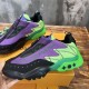 Side angle detail of L Millenium Zip Low Top Trainers Green Purple L Millenium Zip Low Top Trainers Green Purple side angle showing branding and texture