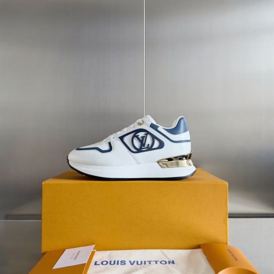 L Trainers White and Blue Box Display Lateral view of L trainers in white and blue displayed on box