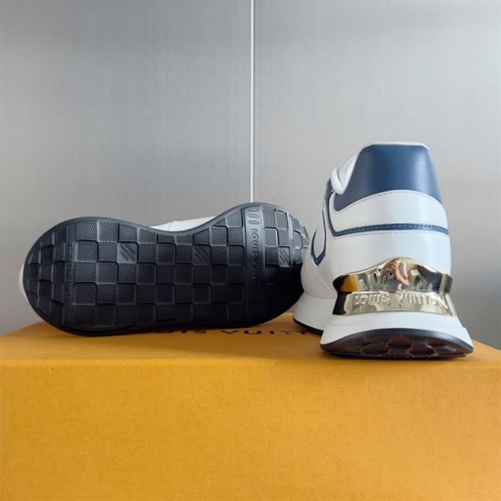 L Trainers White and Blue Sole Detail Sole and heel view of L trainers in white and blue showing tread pattern