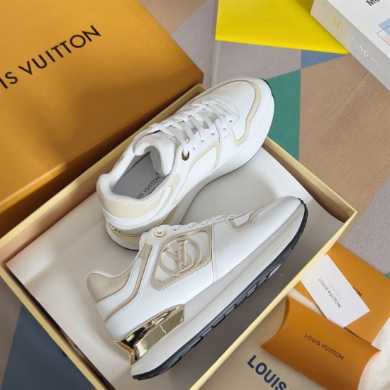 L Neo Run Away Trainers in white, beige, and gold detail stacked inside packaging
