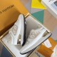 L Neo Run Away Trainers in white, beige, and gold detail angled inside box