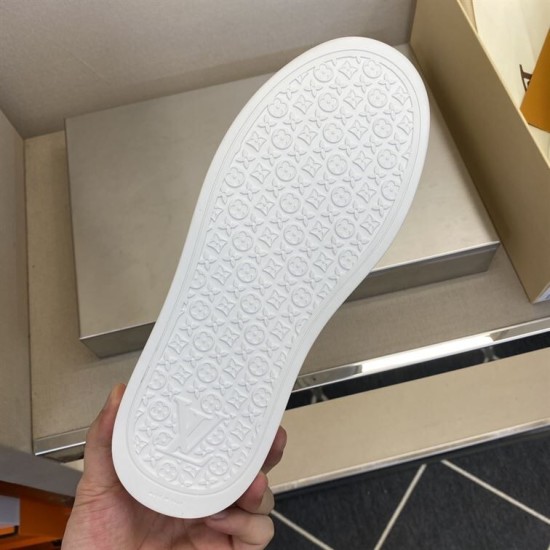 L Resort Black Trainer Tread Pattern Sole View in black and white Underneath view of the white textured rubber outsole on a black L trainer