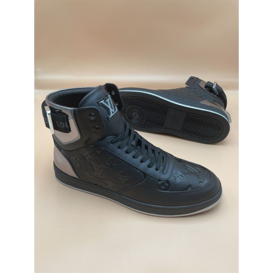 L Rivoli High-Top Leather Monogram Trainers In Black - Sole View Front view of black L high-top trainers with one trainer showing its patterned sole