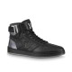 L Rivoli High-Top Leather Monogram Trainers In Black - Side View Side profile of black L high-top trainers showing monogram upper and metallic heel panel