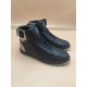 L Rivoli High-Top Leather Monogram Trainers In Black - Pair Front-Quarter Pair of black L high-top trainers displayed together from a front-quarter angle