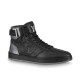 L Rivoli High-Top Leather Monogram Trainers In Black - Studio Angle Studio shot of a single black L high-top trainer against a clean backdrop