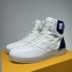 L High Top Trainers Three-Quarter View in white and blue Angled front view of L high top trainers in white and metallic blue