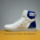 L High Top Trainers Inner Side in white and blue Inner lateral view of L high top trainers in white and metallic blue