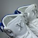 L High Top Trainers Tongue Detail in white and blue Close-up of tongue logo patch on L high top trainers in white and blue