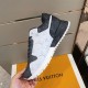 Side Panel Detail of L Trainers in grey and white Angled view highlighting the side panels of L grey and white trainers
