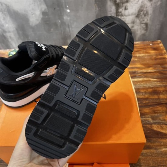 L black low top mesh trainers rubber outsole tread pattern L black low top mesh trainers sole underside