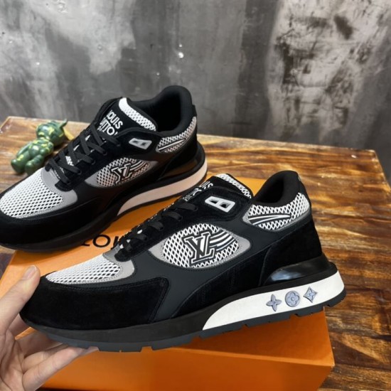 Side angle of L Run Away Mesh Panel Monogram Midsole Trainers in black and grey Side angle of L Run Away Mesh Panel Monogram Midsole Trainers held in hand in black and grey