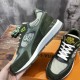 Close-up view of L green trainer upper showing panel construction and eyelets