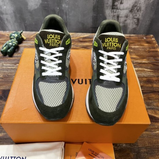 Front view of L green trainers showing lace-up closure and mesh toe box