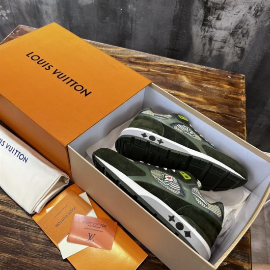 Pair of L green trainers neatly arranged inside branded storage box