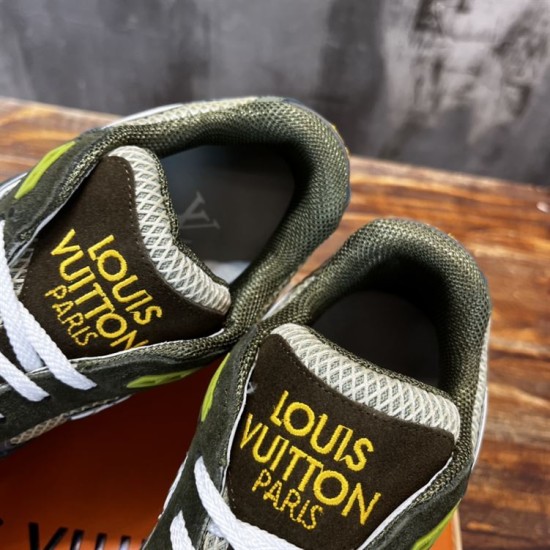Detailed view of the padded tongue and collar on L green trainers