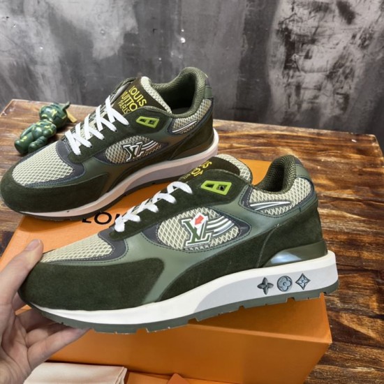 Angled side view of L green trainers highlighting side logo embroidery and panels