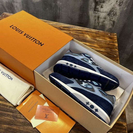 L blue mesh suede low top trainers neatly packed inside storage box L blue mesh suede low top trainers neatly packed inside storage box