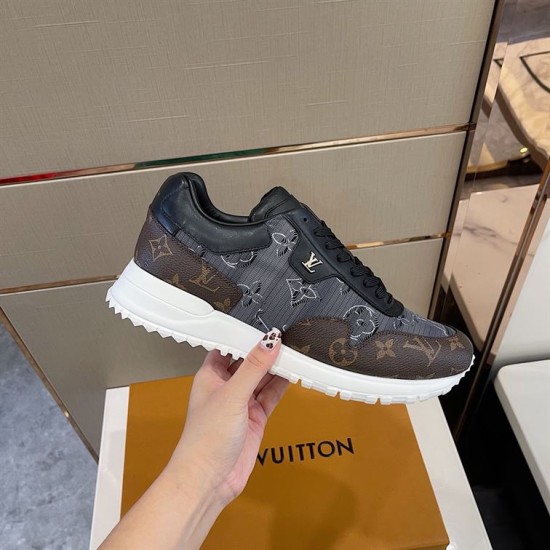 Handheld lateral view of L Run Away Monogram Pattern Black Brown Sneakers Handheld lateral angle highlighting the black and brown panels of L Run Away Monogram Pattern Black Brown Sneakers