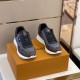 Pair view of L Run Away Monogram Pattern Black Brown Sneakers on box Pair of L Run Away Monogram Pattern Black Brown Sneakers resting atop a branded box