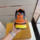 L Runner Tatic Trainers Heel Detail in orange and yellow Rear view of the L Runner Tatic orange and yellow trainers featuring heel pull tab