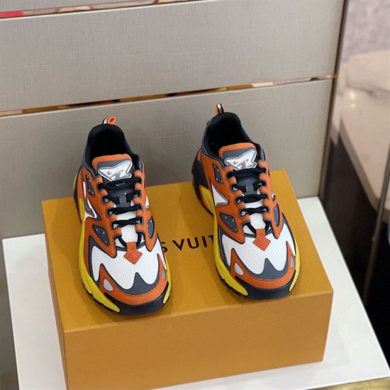 L Runner Tatic Trainers Frontal View in orange and yellow Frontal top angle view showcasing the toe box and lacing of the L Runner Tatic trainers in orange and yellow