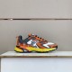 L Runner Tatic Trainers Outer Angle in orange and yellow Outer side angle of the orange and white L Runner Tatic trainers showing panel details in orange and yellow