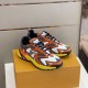 L Runner Tatic Trainers Dual Display in orange and yellow Angled pair perspective of the L Runner Tatic orange suede trainers on display in orange and yellow