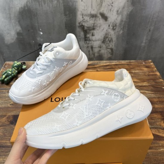 Pair of L white trainers Pair of L white trainers showing side and top angles