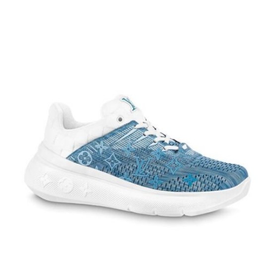 L Blue and White Trainers Studio View Studio outer side profile of L blue and white trainers against a white background