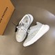 Angled View of L Show Up Monogram Pattern Chunky Sole Low Top Trainers in white and grey Angled top-down view of the white and grey L Show Up Monogram Pattern Chunky Sole Low Top Trainers next to an orange box
