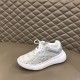 Front Three-Quarter View of L Show Up Monogram Pattern Chunky Sole Low Top Trainers in white and grey Three-quarter front view of the white and grey L Show Up Monogram Pattern Chunky Sole Low Top Trainers showcasing the toe box and laces
