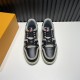 L Trainer Top Down View in black and grey L Trainer low top black and grey leather trainers viewed directly from above showing lacing and toe boxes