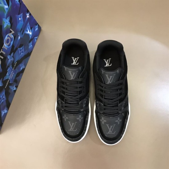 Top View - L Trainer Monogram Canvas Low Top Black Trainers in black and white Top-down view of both L Trainer Monogram Canvas Low Top Black Trainers laid out flat in black and white