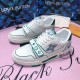 L Trainer Green Mesh Low Top Trainers Angled Pair Angled pair arrangement of L Trainer Green Mesh Low Top Trainers