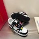 L Trainer Maxi Low-Top Trainers in white and black outsole angle Overhead angle of L Trainer Maxi Low-Top Trainers in white and black with sole up