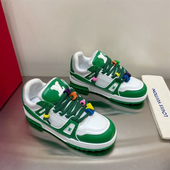 L Trainer Maxi Low Top Trainers White Green - Pair Angle Angled pair view of L Trainer Maxi trainers showcasing green and white uppers