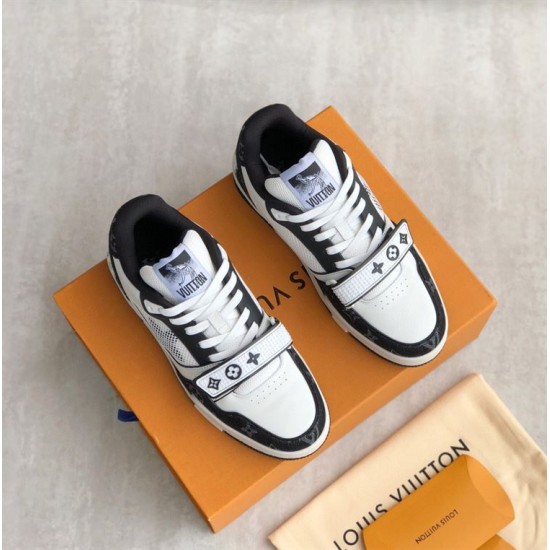 Pair view of L Monogram Denim Strap Trainers in denim and black Pair of L Monogram Denim Strap Trainers viewed from above in denim and black