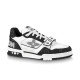 Side view of L Monogram Denim Strap Trainers in black and white Side profile of L Monogram Denim Strap Trainers in black and white