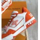 Lateral Side View of Orange L Trainer Monogram Denim Low Top Trainers in orange and white Outer side panel of orange and white L trainers showing monogram denim and heel branding