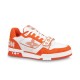 Studio View of Orange L Trainer Monogram Denim Low Top Trainers in orange and white Studio side profile of orange and white L low top trainers on plain background