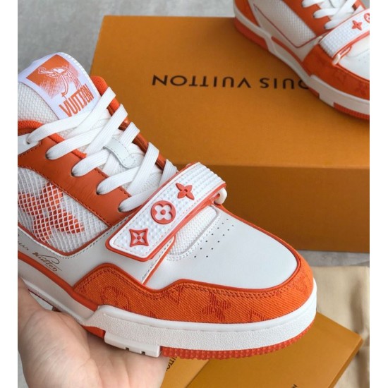 Forefoot Detail of Orange L Trainer Monogram Denim Low Top Trainers in orange and white Close up of toe box and velcro strap on orange and white L trainers