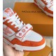 Forefoot Detail of Orange L Trainer Monogram Denim Low Top Trainers in orange and white Close up of toe box and velcro strap on orange and white L trainers