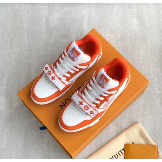 Display View of Orange L Trainer Monogram Denim Low Top Trainers in orange and white Angle showing both orange and white L trainers positioned on a branded box