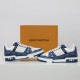 Opposite Side Profile View - L Trainer Monogram Denim Blue And White Low Top Trainers Opposite side profile view of L Trainer Monogram Denim Blue And White Low Top Trainers with packaging background
