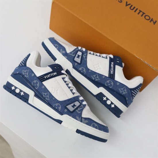 Angled Pair View - L Trainer Monogram Denim Blue And White Low Top Trainers Angled pair view of L Trainer Monogram Denim Blue And White Low Top Trainers next to brand box